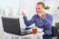 Young businessman working in the office, very concerned, a panic, crumpled paper. Royalty Free Stock Photo