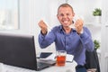 Young businessman working in the office, very concerned, a panic, crumpled paper. Royalty Free Stock Photo