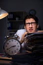 The young businessman working overtime late in office Royalty Free Stock Photo