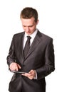 Young businessman working on a tablet pc comuter