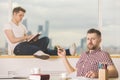 Young businessmen reading book and doing paperwork Royalty Free Stock Photo