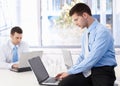 Young businessmen working on laptop Royalty Free Stock Photo