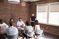 Young Businesswoman Addressing Boardroom Meeting Royalty Free Stock Photo