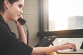 Young Businesswoman answering phone call Royalty Free Stock Photo