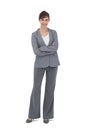 Young businesswoman with arms crossed smiling at camera Royalty Free Stock Photo