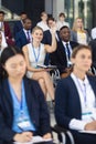 Young Businesswoman asking question in speech in conference room Royalty Free Stock Photo