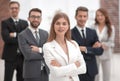 Young businesswoman on the background of her business team Royalty Free Stock Photo