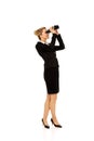 Young businesswoman with a binocular