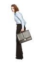 Young businesswoman with briefcase runing away in fright