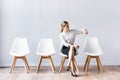 Businesswoman in office on white wall Royalty Free Stock Photo