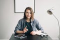 Young Businesswoman Conducting a Video Conference from Office or Home, Engaged and Confident, Demonstrating Life