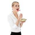 Young businesswoman eating salad Royalty Free Stock Photo