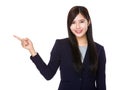 Young businesswoman with finger point upwards Royalty Free Stock Photo