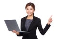 Young Businesswoman hold with notebook computer and finger point Royalty Free Stock Photo