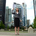 Young businesswoman holding documents Royalty Free Stock Photo