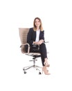 Young businesswoman with laptop sitting in office chair Royalty Free Stock Photo