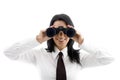 Young businesswoman looking through binocular Royalty Free Stock Photo