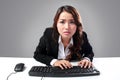 Young businesswoman looking into a screen