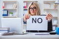 The young businesswoman with message in the office Royalty Free Stock Photo