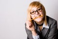 Young businesswoman with pencil