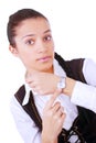 Young businesswoman pointing on her watch
