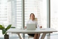 Young businesswoman relaxing leaning on comfortable ergonomic ch