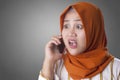 Young Businesswoman Shocked by Phone Call