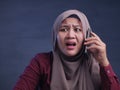 Young Businesswoman Shocked by Phone Call Royalty Free Stock Photo