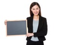 Young Businesswoman showing the chalkboard Royalty Free Stock Photo