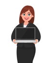 Young businesswoman showing new laptop . Person holding wireless digital computer. Female character design illustration.