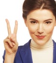 Young businesswoman showing a victory sign i Royalty Free Stock Photo