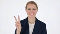 Young Businesswoman Showing Victory Sign on White Background Royalty Free Stock Photo