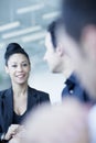 Young businesswoman sitting in a business meeting with colleagues Royalty Free Stock Photo