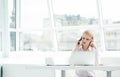 Young businesswoman sitting at office Royalty Free Stock Photo