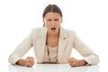 Ive had enough. A young businesswoman slamming her fists down in anger and frustration, isolated on white. Royalty Free Stock Photo