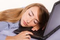 Young businesswoman sleeping on the laptop Royalty Free Stock Photo