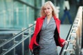 Young fashion business woman on the office stairs Royalty Free Stock Photo