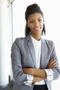 Young Businesswoman Standing In Corridor Of Modern Office Building Royalty Free Stock Photo