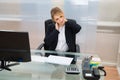 Young businesswoman suffering from neckache Royalty Free Stock Photo