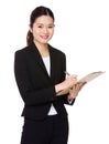 Young Businesswoman take note on clipboard Royalty Free Stock Photo
