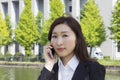 Young businesswoman talking with a mobile phone