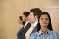 Young businesswoman with team Royalty Free Stock Photo