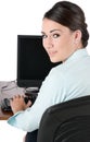 Young businesswoman typing, isolated Royalty Free Stock Photo