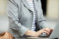 Young Businesswoman using Laptop Outdoors Closeup Royalty Free Stock Photo