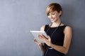 Young businesswoman using tablet