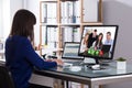 Businesswoman Video Conferencing On Computer