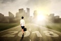 Young businesswoman walking toward a city Royalty Free Stock Photo