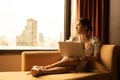 A young businesswoman who travels all over the world to do business. must stay and live in a hotel as a place to relax