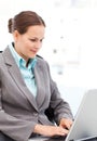 Young businesswoman working on the laptop