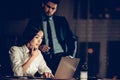 Young Businesswoman Working in Office at Night Royalty Free Stock Photo